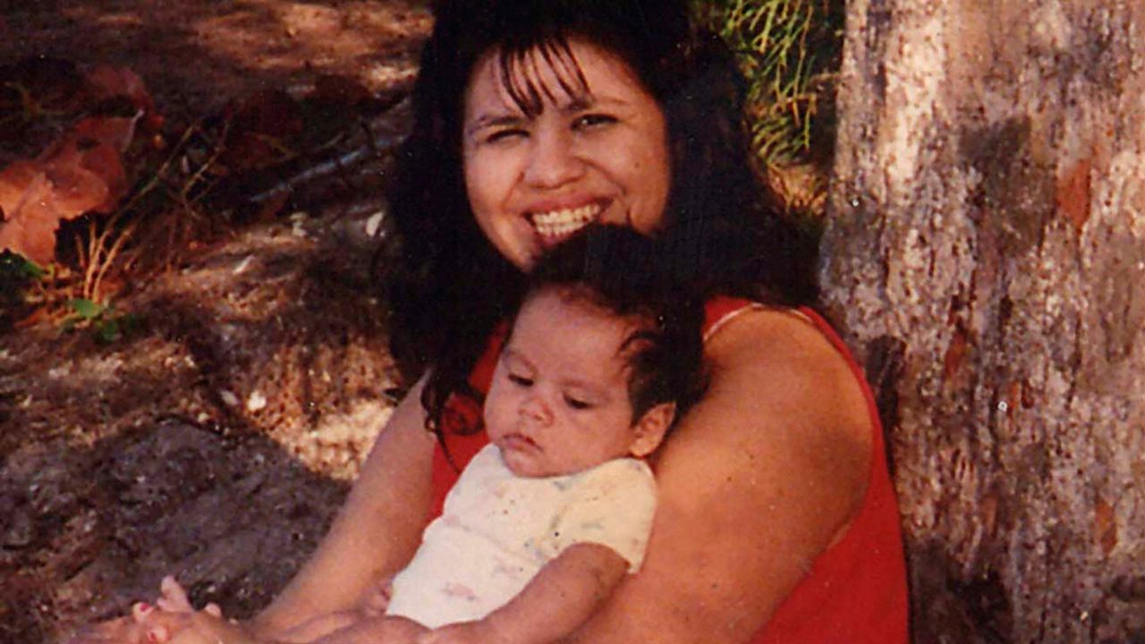 In this undated photograph, Texas death row inmate Melissa Lucio is holding one of her sons, John.