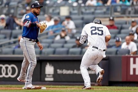 New York Mets pitcher Taijuan Walker throws to first base to check on New  York Yankees baserunner Gleyber Torres during the second inning of a  baseball game on Saturday, Sept. 11, 2021