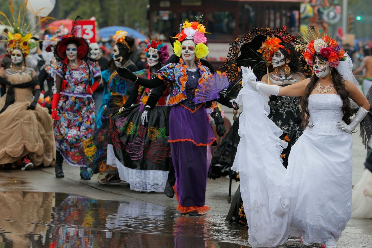 Skulls, masks and dancers as Mexico fetes Day of the Dead