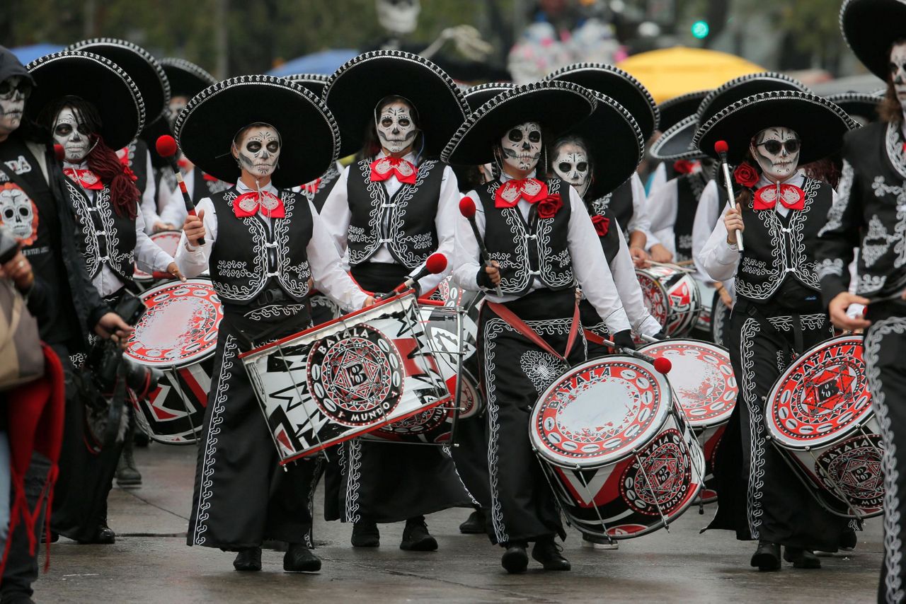 Skulls, masks and dancers as Mexico fetes Day of the Dead