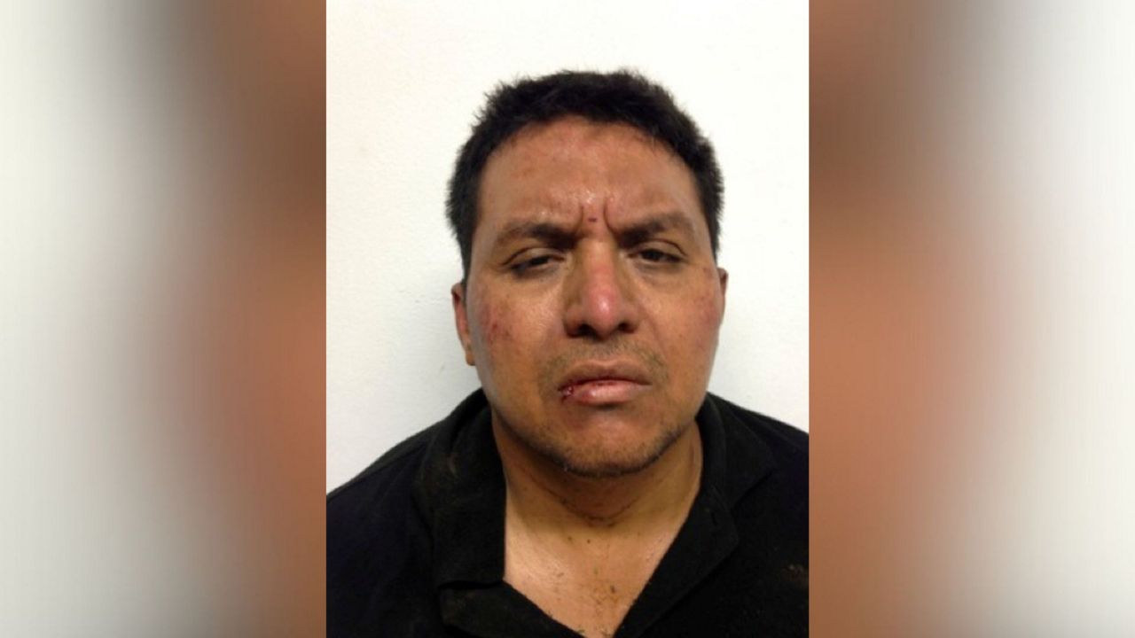 This file photo shows a mug shot, released on July 15, 2013 by Mexico's Interior Ministry, of Zetas drug cartel leader Miguel Angel Trevino Morales after his arrest in Mexico. (AP Photo/Mexico's Interior Ministry, File)