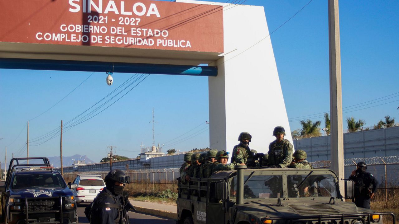 Mexican military and police patrol in Culiacan, Sinaloa state, Mexico, Jan. 6, 2023. (AP Photo/Martin Urista, File)