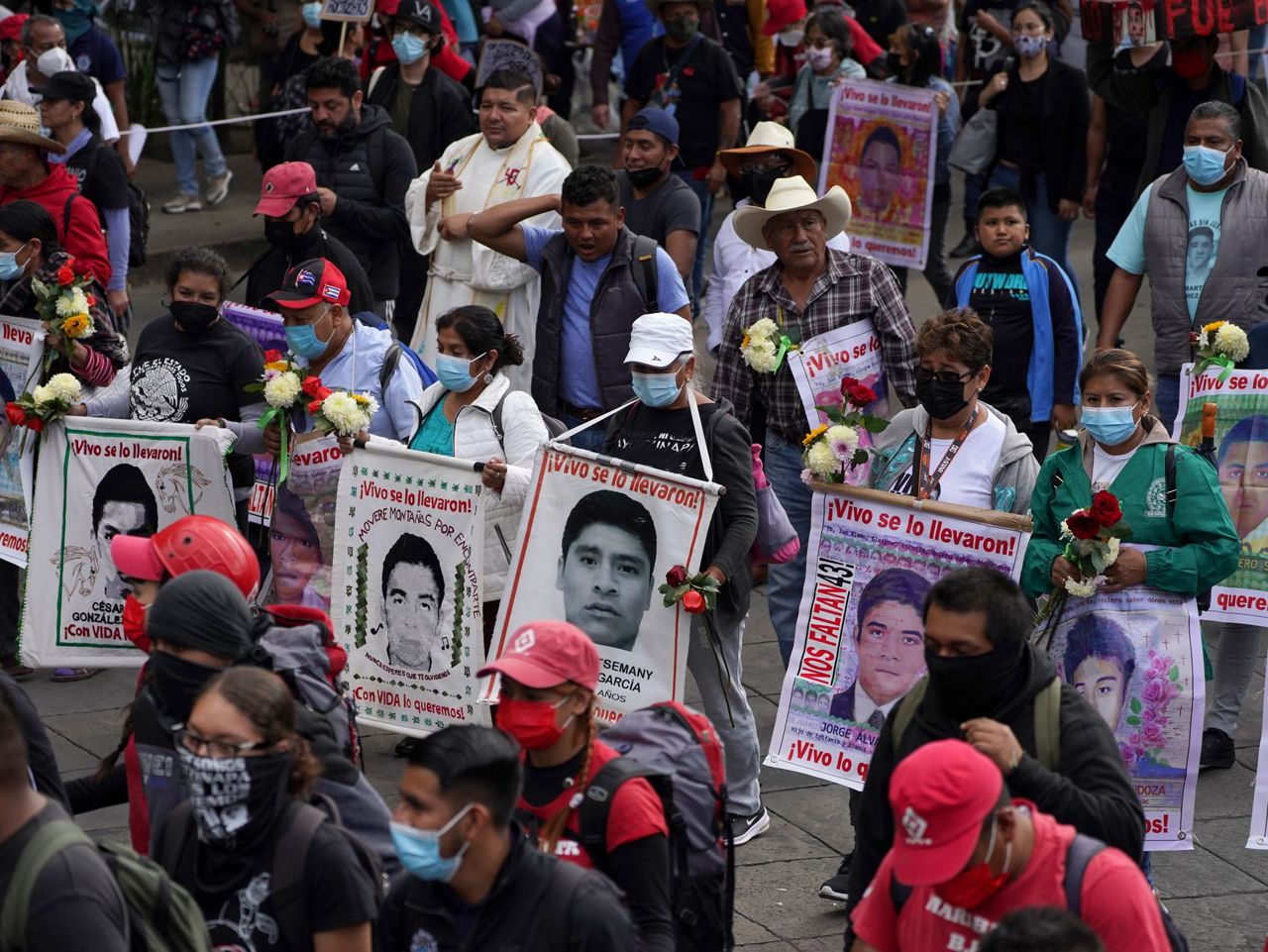 Families of Mexico's missing students march on anniversary