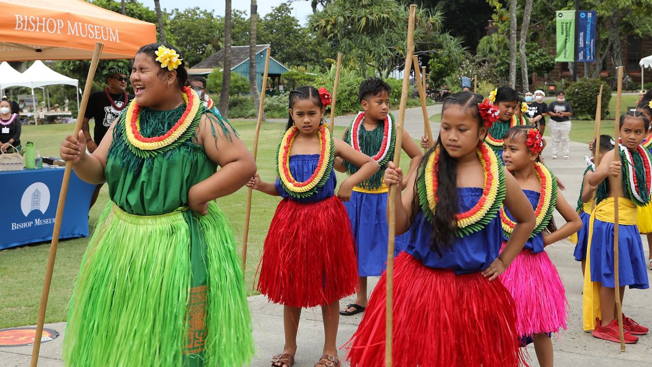 Children who are part of Pacific Voices, an after-school program for Pacific Islanders in Kalihi, perform at the Micronesian Festival 2022. (Photo courtesy of Melissa Lum)