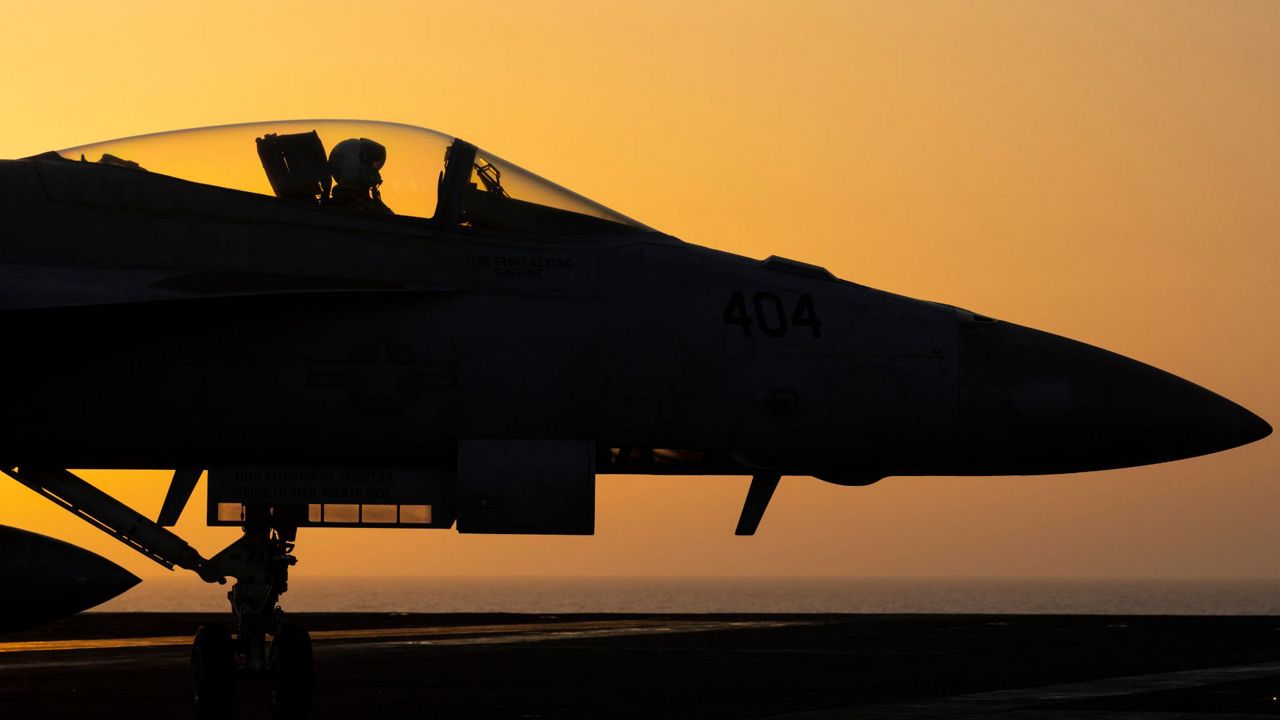 A fighter jet maneuvers on the deck of the USS Dwight D. Eisenhower in the Red Sea, June 11, 2024. (AP Photo/Bernat Armangue, File)