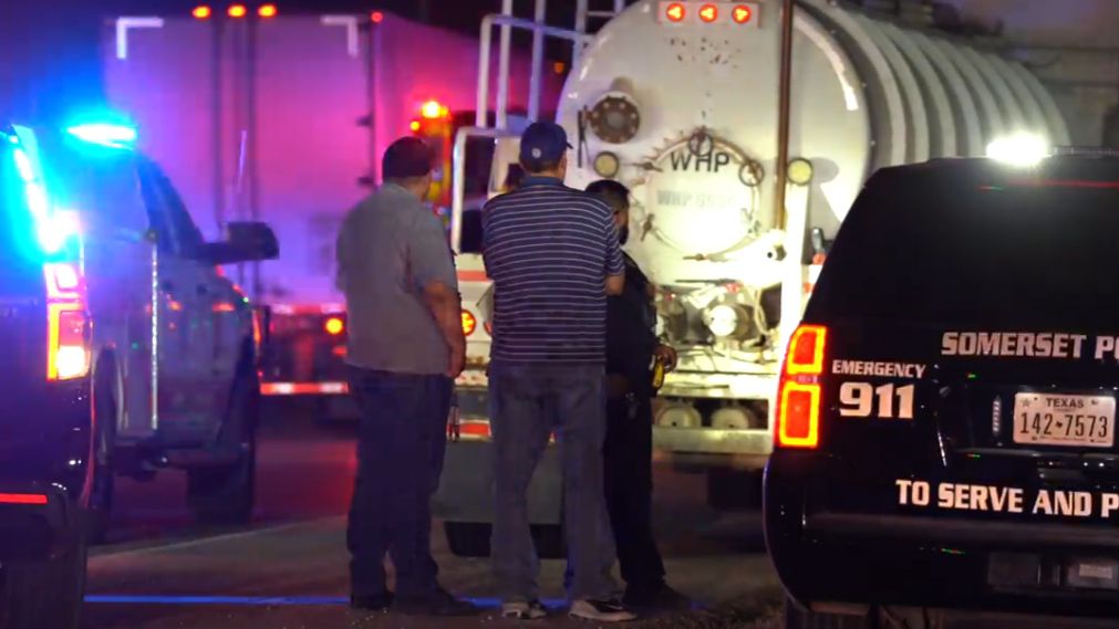 Police on the scene of a traffic stop that resulted in the discovery of 12 migrants hidden in a tanker truck southwest of San Antonio, Texas, in this image from July 19, 2023. (Courtesy: Metro Video Services, LLC. – San Antonio Division)