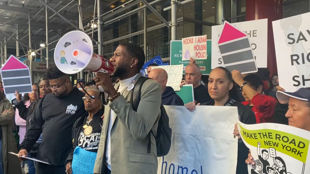 Homeless advocates fighting against the change are pictured.