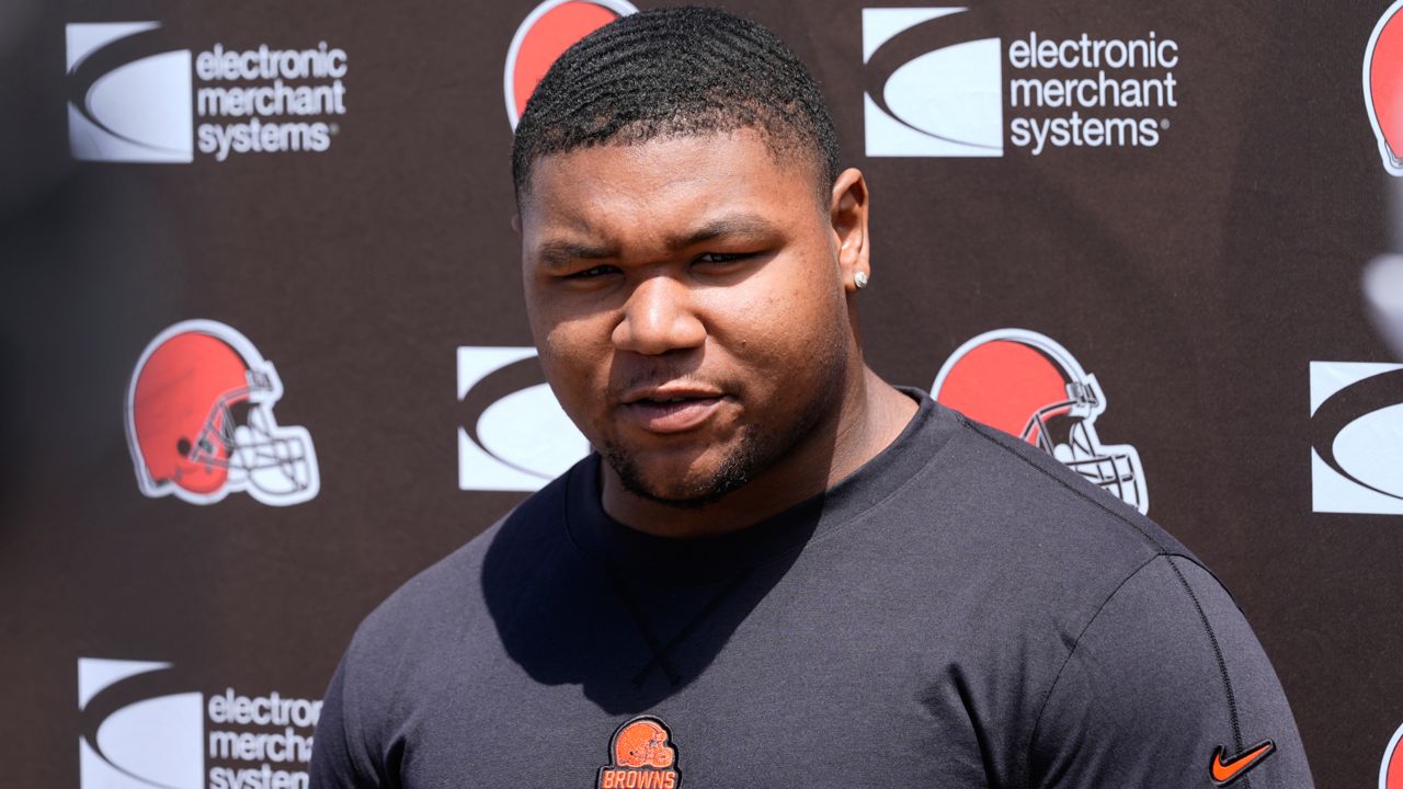 Mike Hall Jr., talks with reporters before a Cleveland Browns NFL football rookie minicamp, May 10, 2024, in Berea, Ohio.