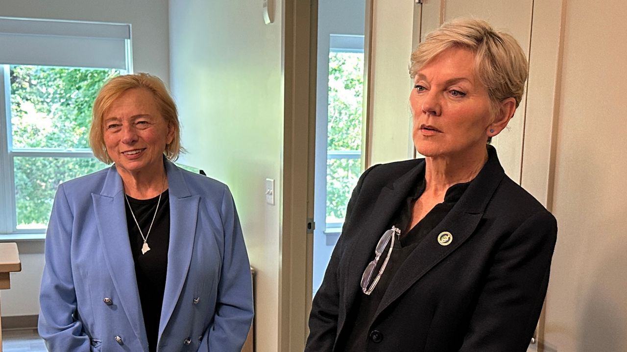 Gov. Janet Mills, left, and U.S. Energy Secretary Jennifer Granholm, tour an energy efficient apartment in Westbrook on Wednesday. (Spectrum News/Susan Cover)