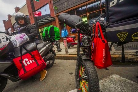 Doordash on a shop motorcycle