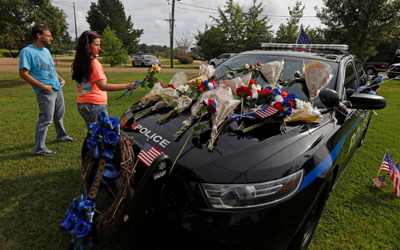 Mississippi city mourns 2 police officers killed in shooting