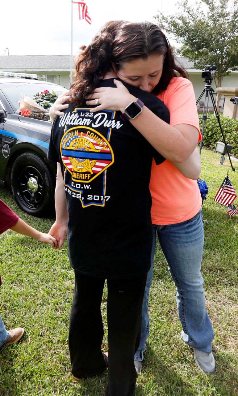 Mississippi city mourns 2 police officers killed in shooting