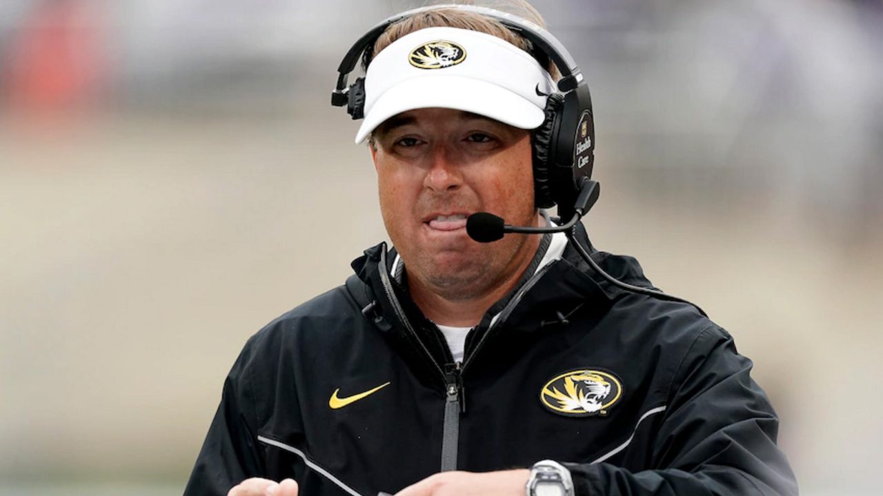 Missouri head coach Eliah Drinkwitz watches during the first half of an NCAA college football game against Kansas State Saturday, Sept. 10, 2022, in Manhattan, Kan. (AP Photo/Charlie Riedel)