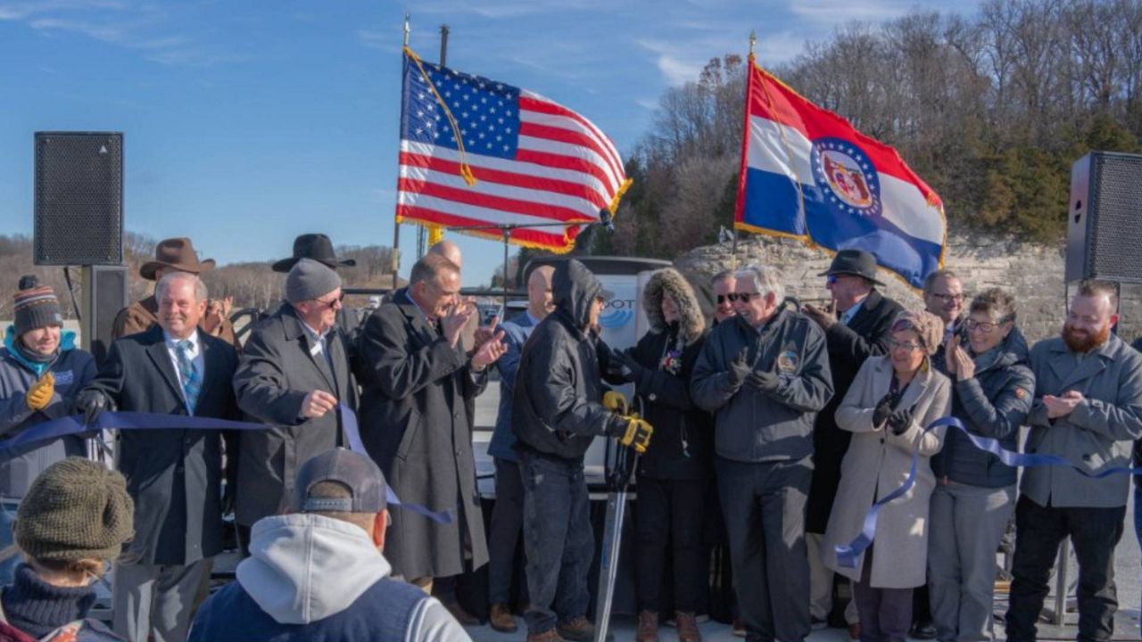 Governor Parson, Lt. Gov. Kehoe, and Dale and Sandy Deraps cut the ribbon on the near-completed eastbound Lance Corporal Leon Deraps I-70 Bridge at Rocheport. (Photo: MoDOT/X)
