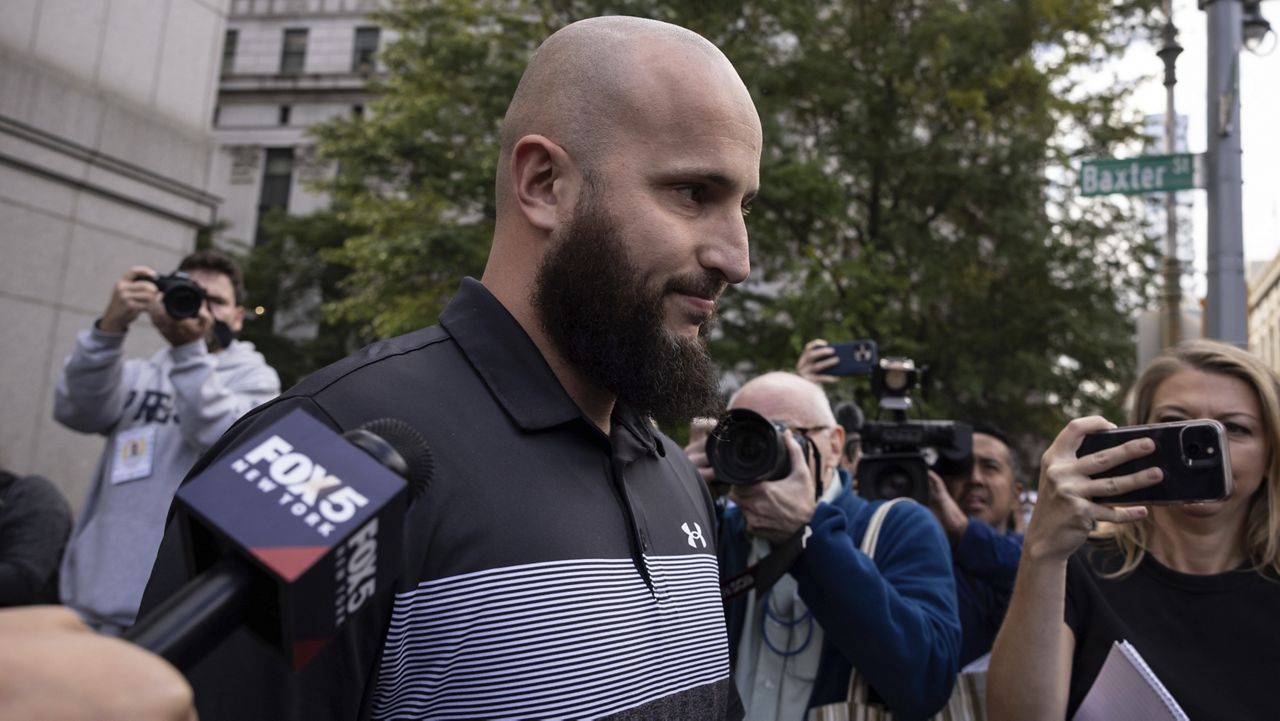 Mohamed Bahi exits Manhattan Federal Court on Tuesday, Oct. 8, 2024. (AP Photo/Yuki Iwamura)