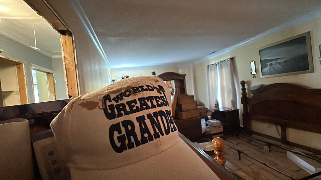 Mud left by flooding during Tropical Storm Chantal coats the master bedroom of Wilhemina Richards' house in Durham. (Spectrum News 1/Patrick Thomas)