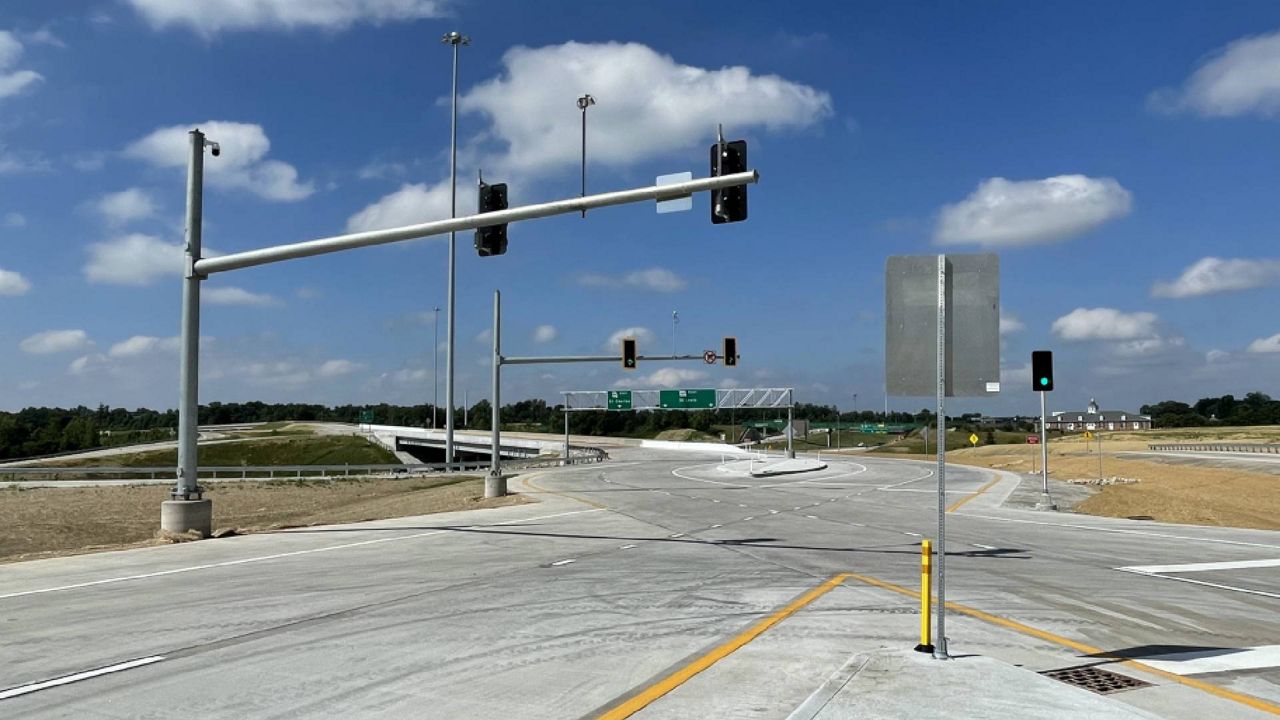 Officials on Wednesday celebrated the completion of a $20 million project to add a third lane of traffic in both directions on Route 94 between Interstate 70 and the 94/Highway 364/Muegge Road interchange, plus a new wider Muegge Road bridge over 94. (Spectrum News/Gregg Palermo)