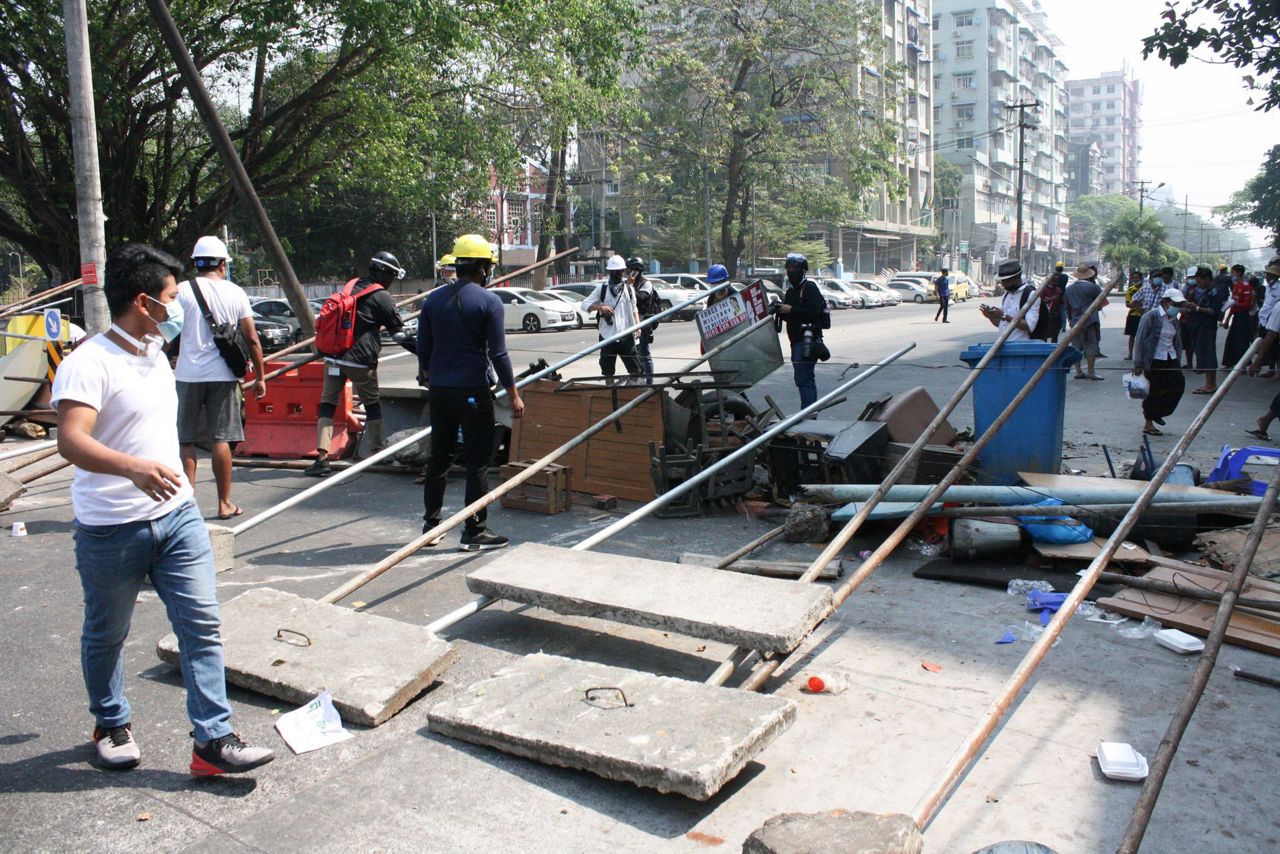 Scores arrested as Myanmar police disperse anti-coup rally