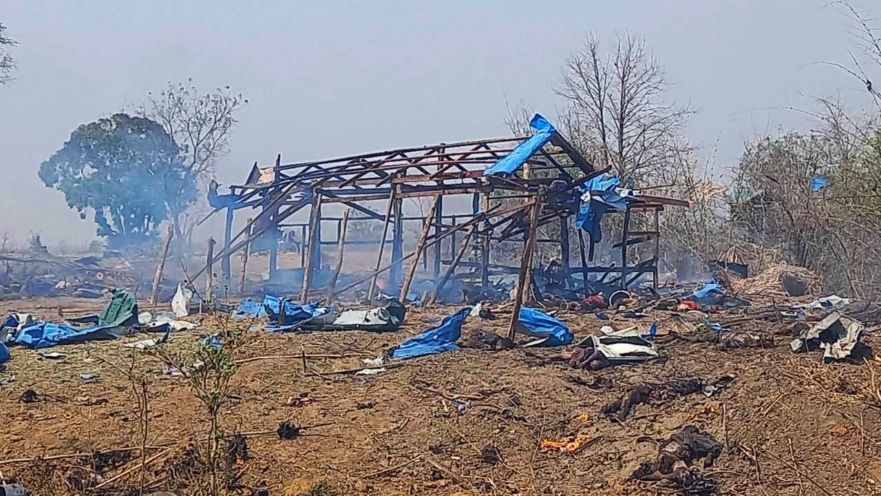 This photo provided by the Kyunhla Activists Group shows aftermath of an airstrike in Pazigyi village in Sagaing Region's Kanbalu Township, Myanmar, Tuesday, April 11, 2023. Witnesses and independent media reports said dozens of villagers in central Myanmar have been killed in an air attack carried out Tuesday by the Southeast Asian country's military government. (Kyunhla Activists Group via AP)