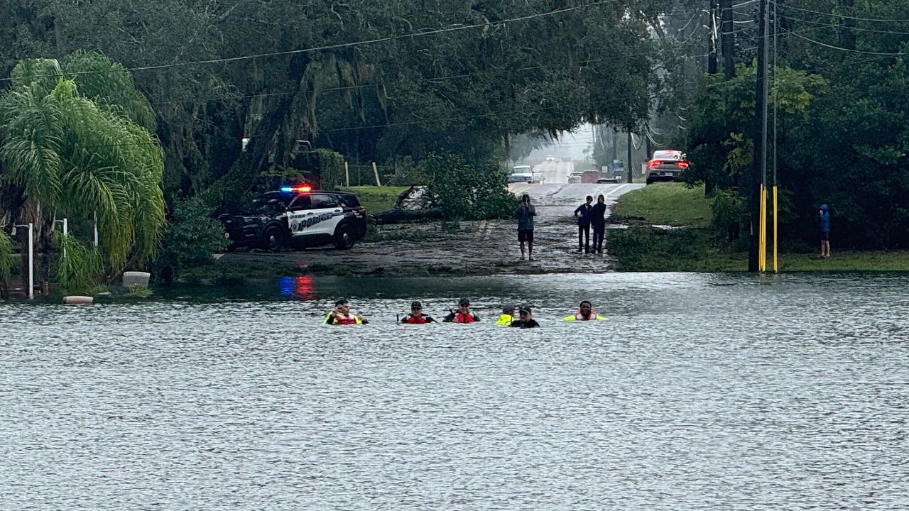 DeLand police conducting high water rescues on Thursday has flood waters plagued streets and homes. (City of DeLand)