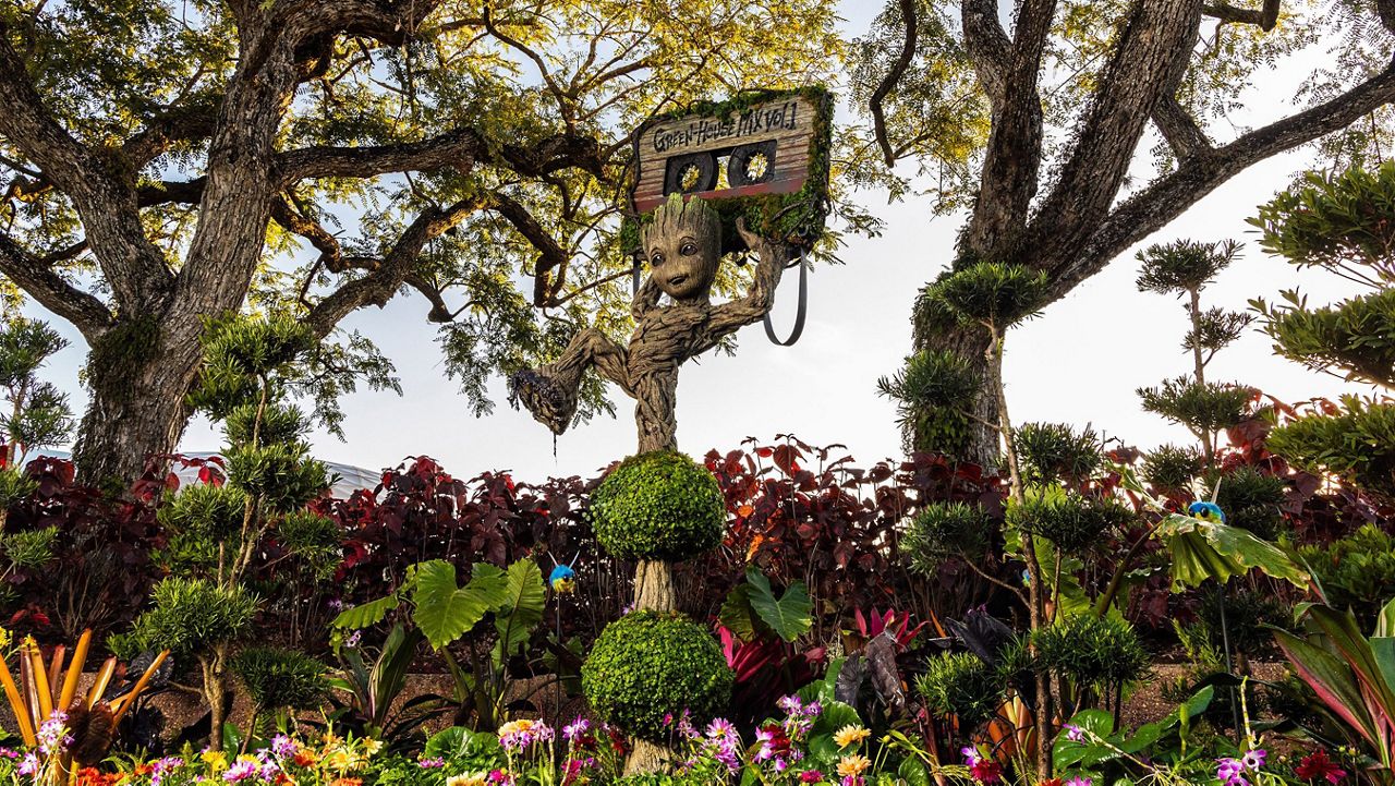 The “Guardians of the Galaxy” character, Groot, is featured holding up a mixtape near the Guardians of the Galaxy: Cosmic Rewind attraction in World Discovery. (Disney)