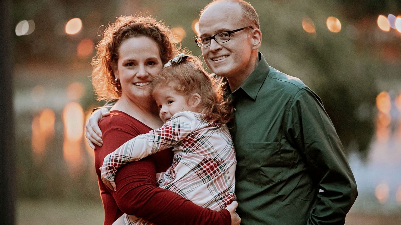 Macy and Eugene Moore with their daughter. (Courtesy: Macy Moore)