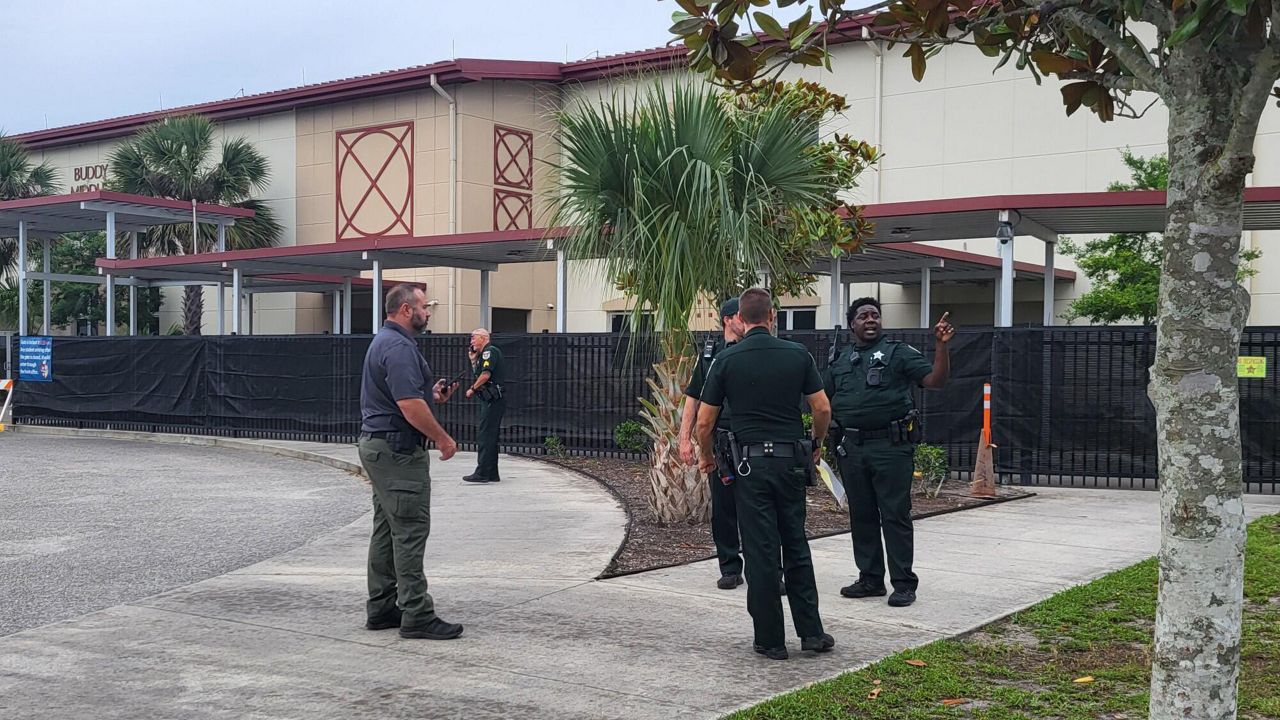 Flagler County Sheriff’s Office deputies respond to Buddy Taylor Middle School on May 17 after the front desk received a suspicious call. (Flagler County Sheriff's Office)