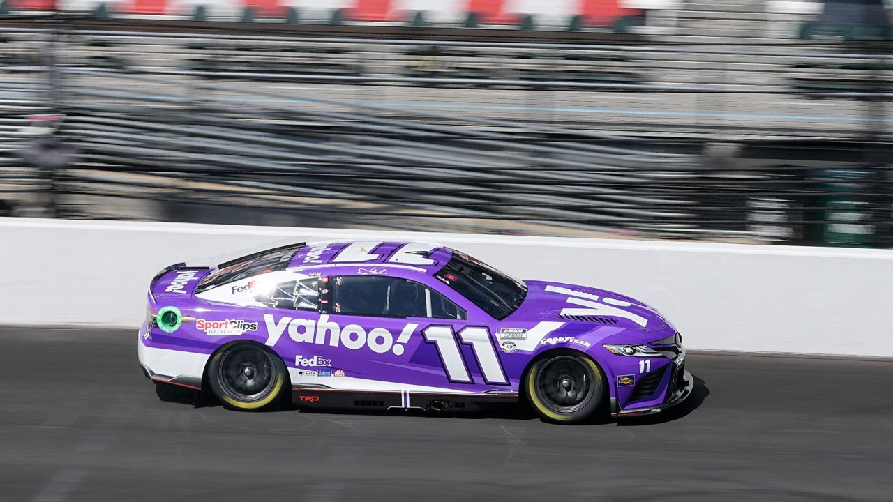 Denny Hamlin drives during a practice session for the NASCAR Cup Series auto race at Indianapolis Motor Speedway, Saturday, Aug. 12, 2023, in Indianapolis. (AP Photo/Darron Cummings)