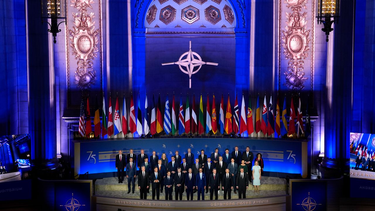 President Joe Biden, front row center, poses during a family photo with allied heads of state and government before delivering opening remarks on the 75th anniversary of NATO at the Andrew W. Mellon Auditorium, Tuesday, July 9, 2024, in Washington. (AP Photo/Evan Vucci)