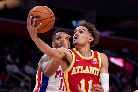 Trae Young of the Atlanta Hawks stands during player introductions