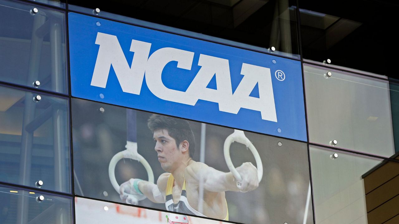 In this April 25, 2018, file photo, the NCAA headquarters is shown in Indianapolis. (AP Photo/Darron Cummings, File)