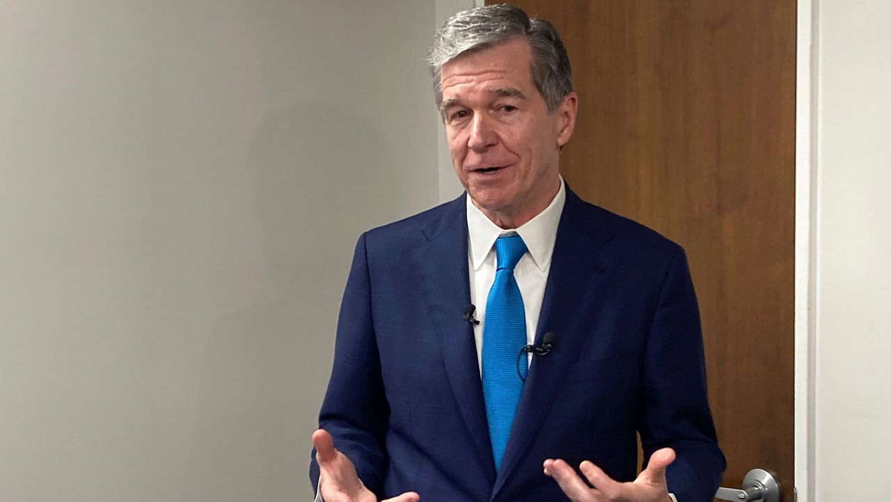 North Carolina Democratic Gov. Roy Cooper speaks to reporters after a Council of State meeting at the state transportation building in Raleigh, N.C., on Tuesday, Sept. 12, 2023. Cooper spoke about delays in the state budget that can now be attributed to a standoff between House and Senate Republicans over whether to insert gambling expansion provisions within the legislation. (AP Photo/Gary D. Robertson)