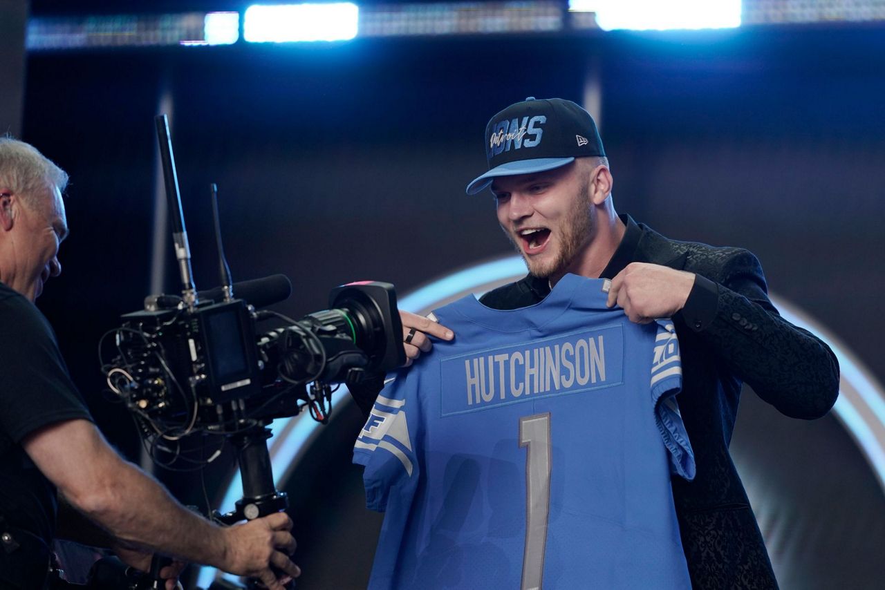 Cincinnati cornerback Ahmad Sauce Gardner holds up a jersey for the New  York Jets with the 4th pick in the NFL football draft on Thursday, April,  28 2022 in Las Vegas. (AP