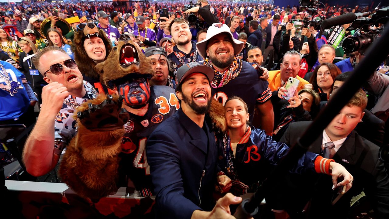 Southern California Quarterback Caleb Williams celebrates after being chosen by the Chicago Bears with the first overall pick during the first round of the NFL football draft, Thursday, April 25, 2024 in Detroit. (Jeff Lewis/AP Images for the NFL)