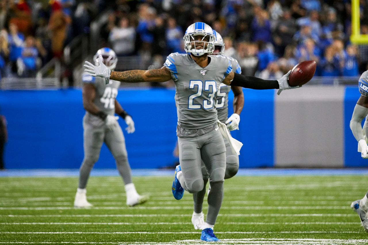 Denver Broncos wide receiver Courtland Sutton (14) is tackled by Detroit  Lions cornerback Dariu …