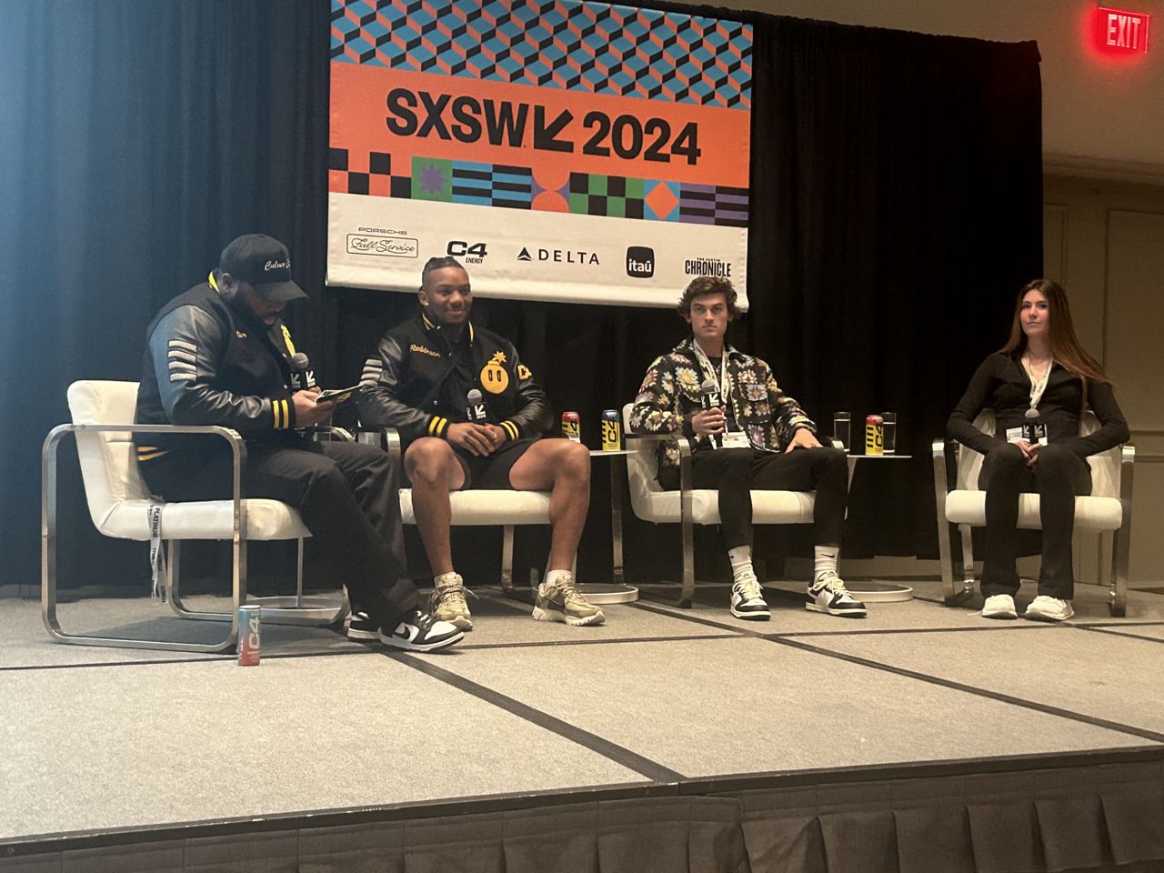 Nutrabolt's Director of Talent & Influencer Marketing Marquel Carter (left) moderated a panel of college athletes talking about NIL featuring Atlanta Falcons running back Bijan Robinson (middle left), Texas track and field star Sam Hurley (middle right) and Texas volleyball player Ayden Aimes (right) at SXSW on Sunday, March 10, 2024. (Katharine Finnerty/Spectrum News)