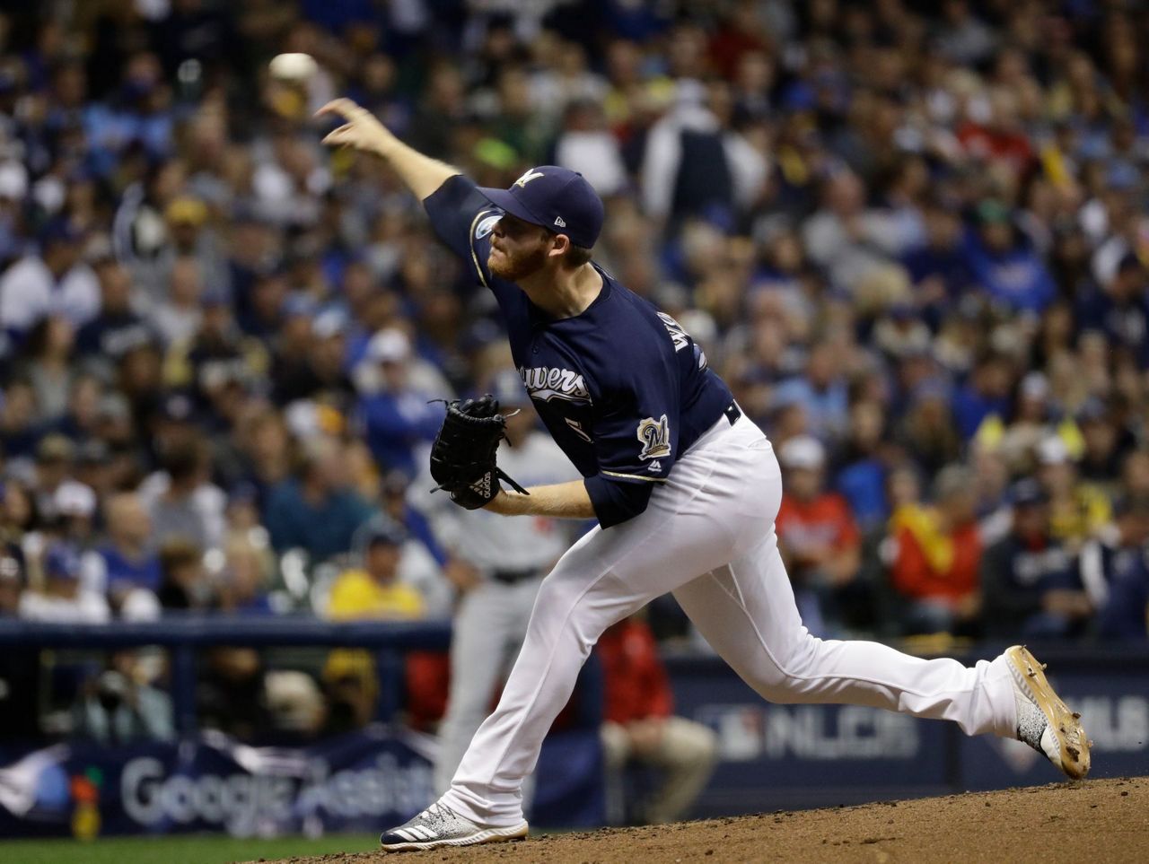 7 of 7. Milwaukee Brewers relief pitcher Brandon Woodruff throws during the...