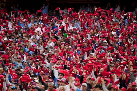 Video: Phillies fans climbing poles outside City Hall after NLCS win - CBS  Philadelphia