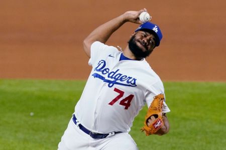 Atlanta Braves pitcher Kenley Jansen delivers against the Texas