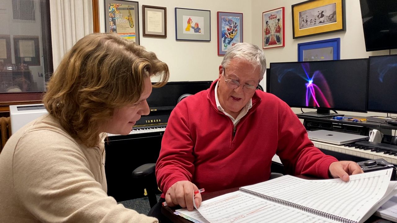 Miller working on the score for Elf