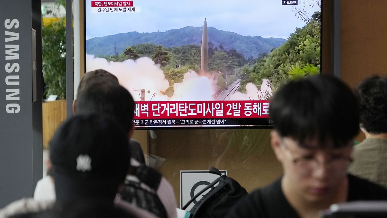 A TV screen shows a file image of North Korea's missile launch during a news program at the Seoul Railway Station in Seoul, South Korea, Wednesday, July 19, 2023. (AP Photo/Ahn Young-joon)