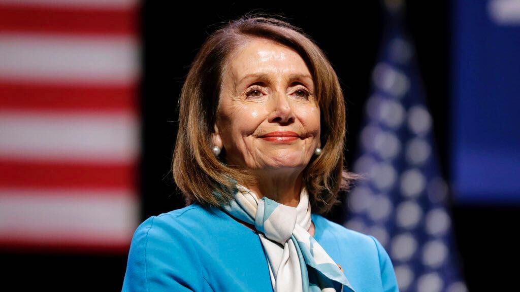 FILE - House Speaker Nancy Pelosi smiles while attending a bill signing ceremony in New York, Monday, Feb. 25, 2019. (AP Photo/Seth Wenig)