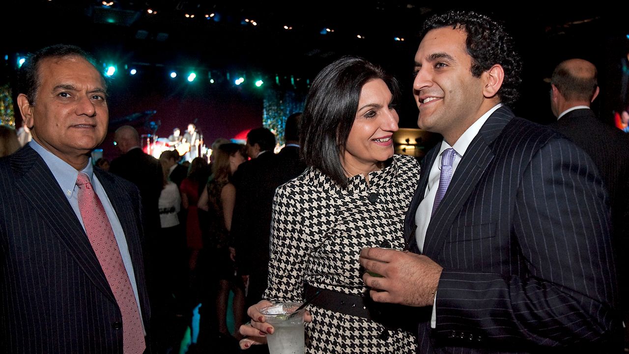 In this Jan. 18, 2011 file photo, Dr. Love Paul, left, Pearl Paul, and their son Nate Paul, right, attend the 2011 Texas Inaugural Celebration at the Palmer Events Center in Austin, Texas.