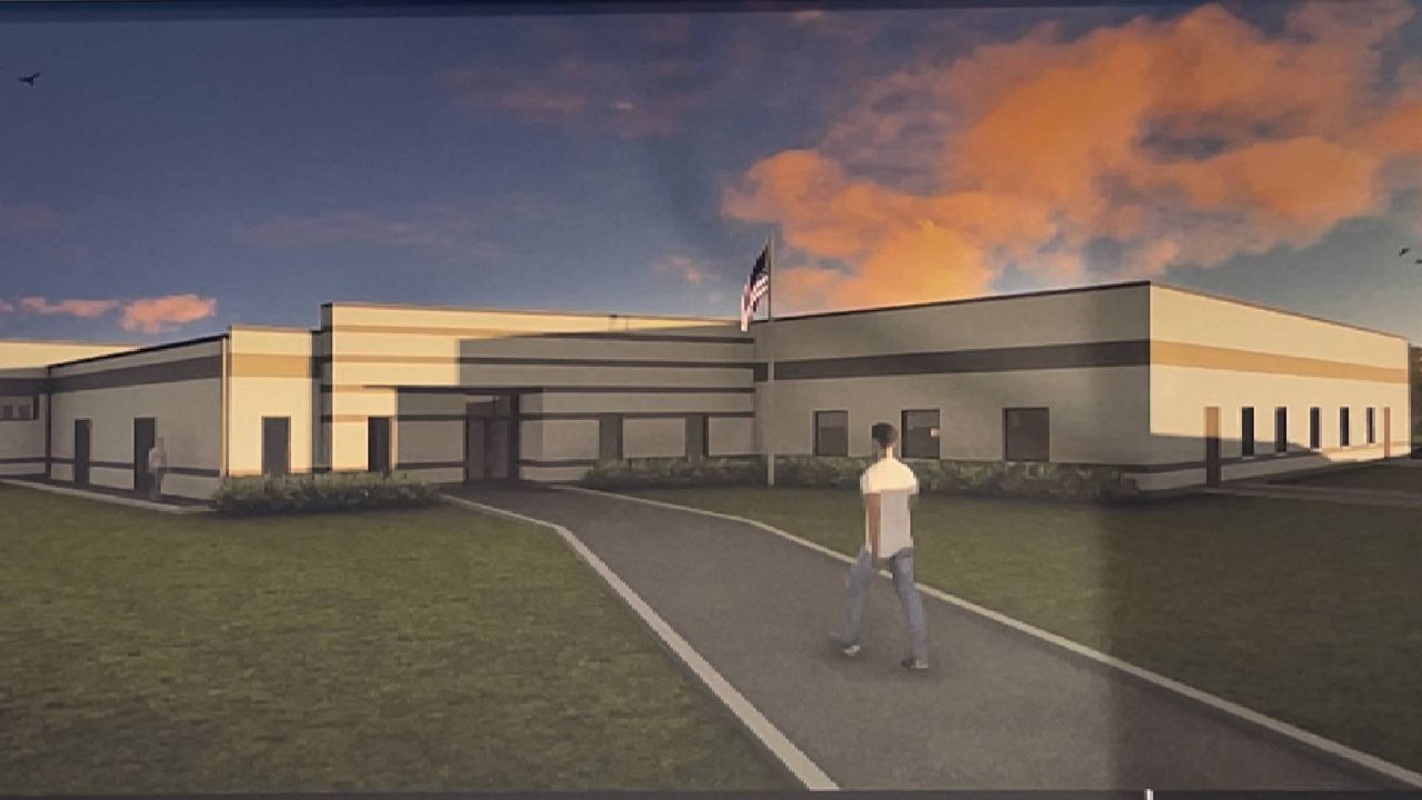 An architectural rendering shows what a $27.3 million Missouri National Guard armory will look like when work is completed on the site just off Highway 367 near Interstate 270 in Bellefontaine Neighbors. (Spectrum News/Gregg Palermo)