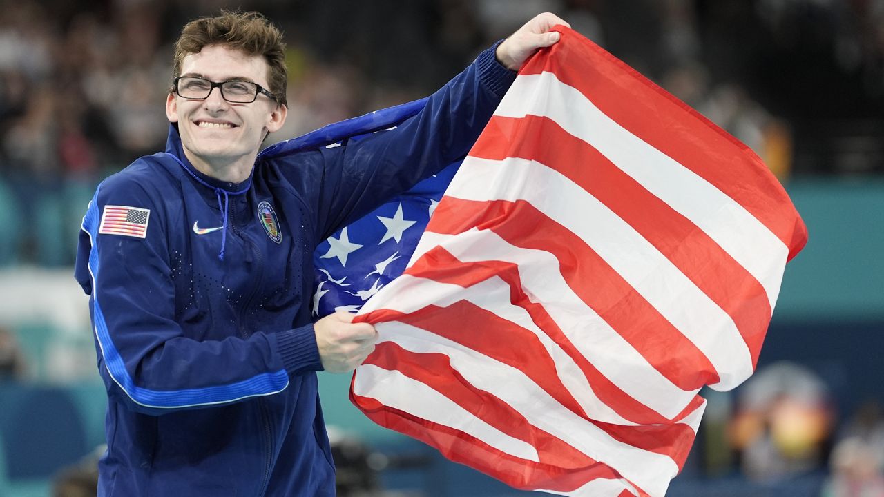 Stephen Nedoroscik, of the United States, celebrates after winning the bronze medal during the men's artistic gymnastics individual pommel finals at Bercy Arena at the 2024 Summer Olympics, Saturday, Aug. 3, 2024, in Paris, France. (AP Photo/Abbie Parr)