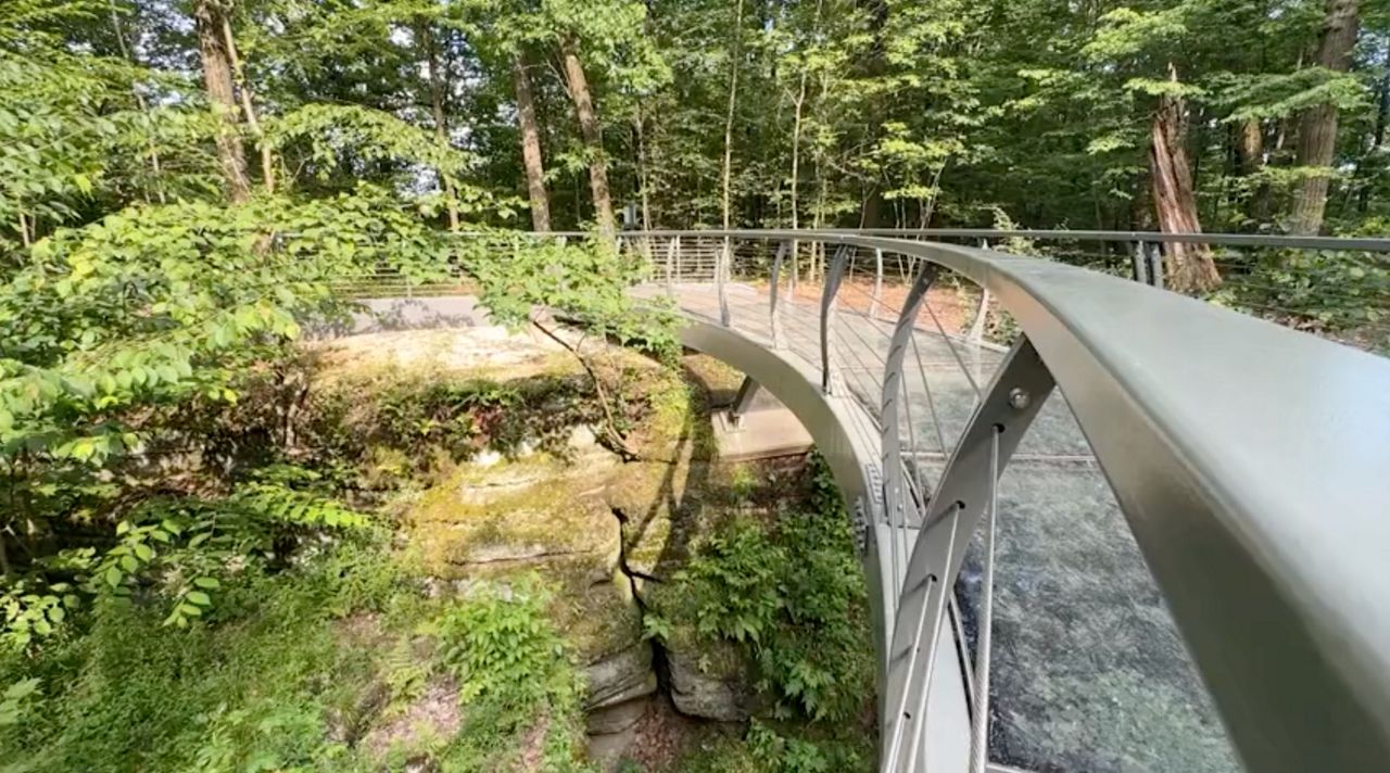 A glass bottom bridge is one of many draws to Nelson Kennedy Ledges State Park. 