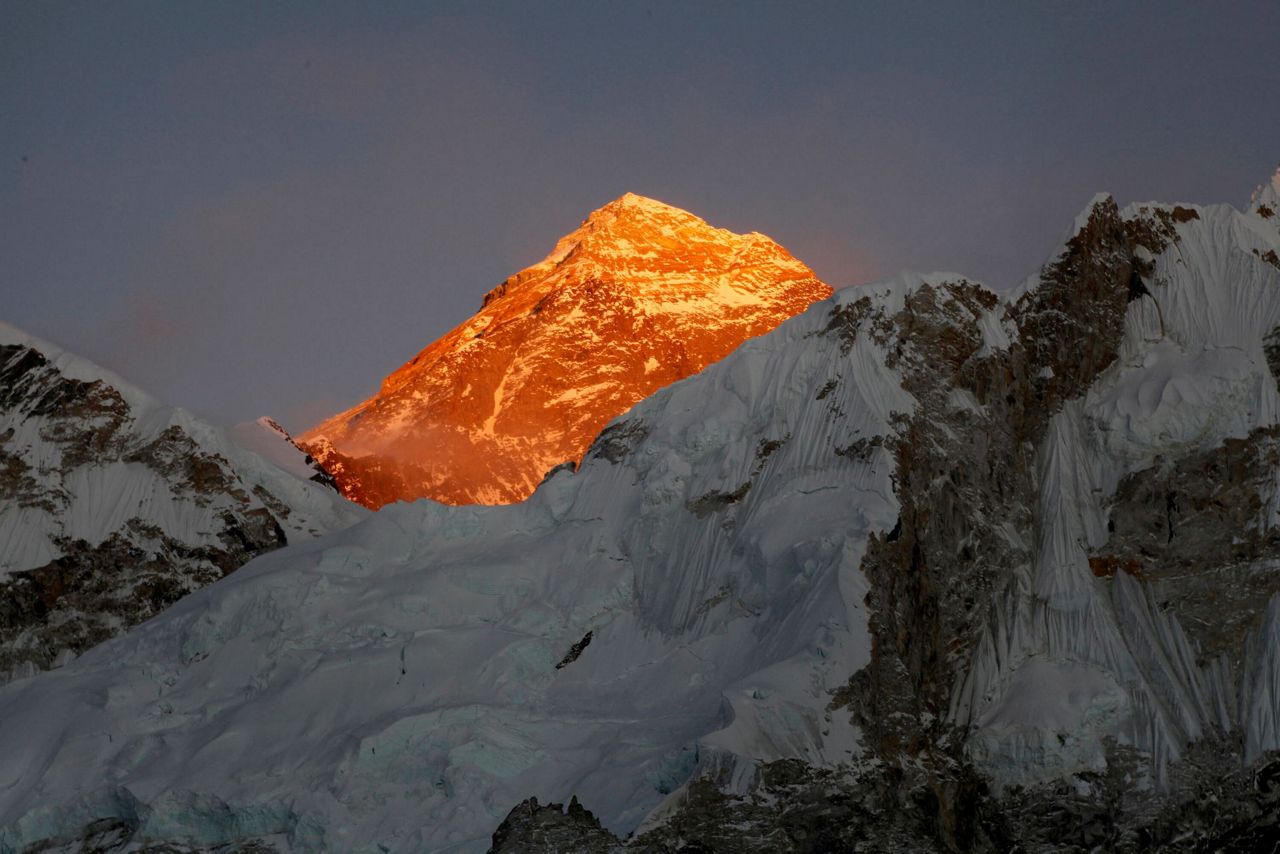 Nepal man shatters record for scaling world's highest peaks