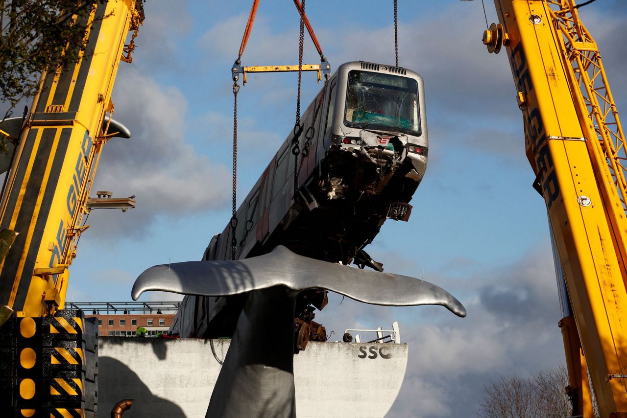 Dutch train caught by whale sculpture to be salvaged