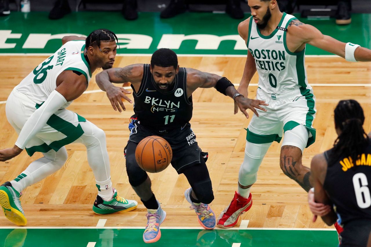 Irving scores 37, leads Nets to 12395 win over Celtics