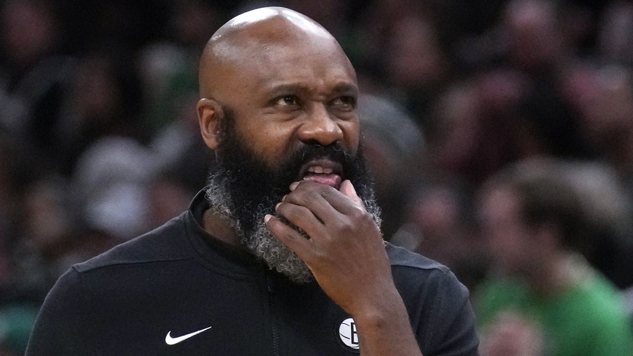 Jacque Vaughn looks towards the scoreboard during a game on Wednesday, Feb. 14, 2024 in Boston.